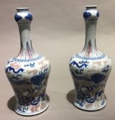 A pair of Chinese porcelain bottle vases