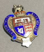 A silver and enamel Masonic fob