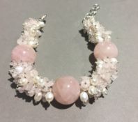 A silver quartz and pearl bracelet