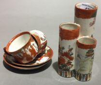 A 19th century Japanese vase and two cups and saucers