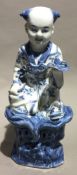 A Chinese blue and white porcelain figure