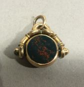 An Edwardian agate and bloodstone spinning fob