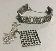 A contemporary silver bracelet and pendant (50 grammes)