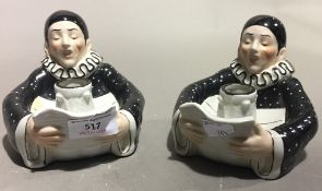 A pair of clown candlesticks