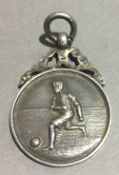 A 1930s silver football fob