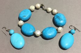 A turquoise suite of jewellery