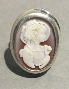 A silver cameo ring