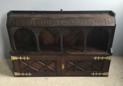 A Victorian gothic style oak side cabinet