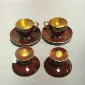 A pair of Carlton Ware Rouge Royale candlesticks,