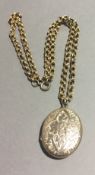 A 9 ct gold chain with a locket