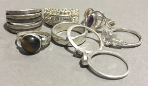 Eight silver rings (37.