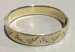 A silver gilt bangle (24.