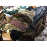 A collection of fur coats and stoles, etc.