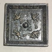 A Chinese patinated bronze plaque