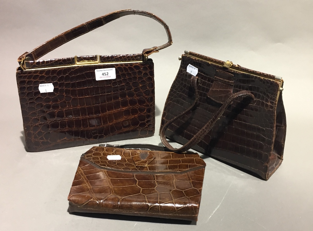 Three vintage crocodile handbags