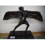 Art Deco style bronze figure of a lady with outstretched arms with batwing cape on raised