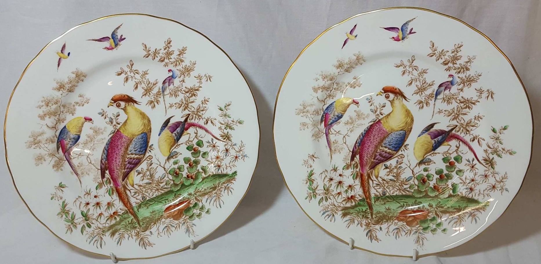 Pair of Royal Worcester 'Pheasant ' cabinet plates with impressed and painted back stamps (diameter