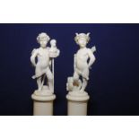 Pair of early 19th C French carved ivory figures of neo-classical form depicting winged cherubs in