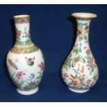 Two Oriental Canton Famille Rose vases decorated with butterfly's, cranes, birds of paradise etc,