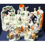 A large selection of Victorian Staffordshire figures and similar continental pair of figures