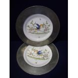 Pair of Faince ceramic plates in French pewter mounts,