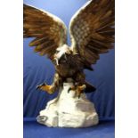 Extremely large Italian ceramic figure of a eagle with wings outspread upon rocky outcrop No.