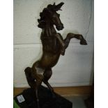 Bronze figure of a rearing horse on square marble base (height 36.