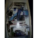 Box of assorted black and white and coloured photographs of various buses,