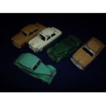 Five assorted vintage Dinky cars including Ford Sedan, Ford Zephyr,