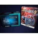 Boxed Futaba Attack digital proportional 2DR remote control system and a boxed 2CH AM radio control