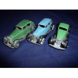 Three early Dinky saloon cars