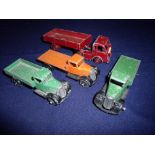 Four early Dinky toys wagons