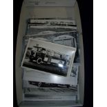 Box containing a quantity of black and white early bus photographic prints