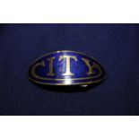 Oval enamel City Transport cap badge by L Simpson