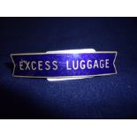 Midland region brass and enamel "Excess Luggage" railway small fishtail cap badge by JR Gaunt