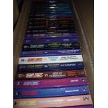 Extremely large selection of Star Trek paperback books in five boxes including The Original Series