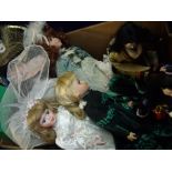 Large selection of various assorted costume dolls