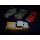 Four Dinky vehicles including Loudspeaker Van,