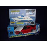 Boxed radio controlled Dodge Viper GTS and a boxed scale 1/30 radio controlled Dolphin Nikko