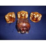 Three 18th/19th C treacle glaze Spaniel head money jars (approx height 8cm) and a brown glazed 18th