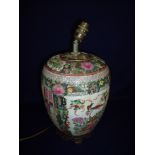 Oriental famille rose style table lamp with four panels depicting various figures within room