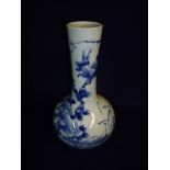 Oriental blue and white bottleneck vase with 9 digit signature panel to the base (height 28.