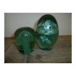 Victorian green glass paperweight with floral detail (approx 15cm high) and another smaller