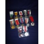 Group of 12 assorted world medals from various former Soviet States, Middle East,