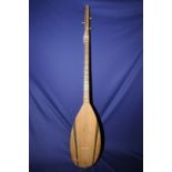 Three string Indian style guitar with elongated neck and swollen wood body with inlaid detail,