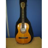 Small Encore Model No. ENC36N six string acoustic guitar with carry case (back measures 46.