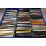 Case containing a large selection of CD's including 'The Best Of George Michael',