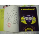 Signed Ten Kate James Toseland t-shirt and associated hard back edition of Year in Motor GP singed