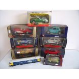 A selection of boxed Bburago cars,