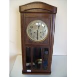 Mahogany cased steel faced wall clock